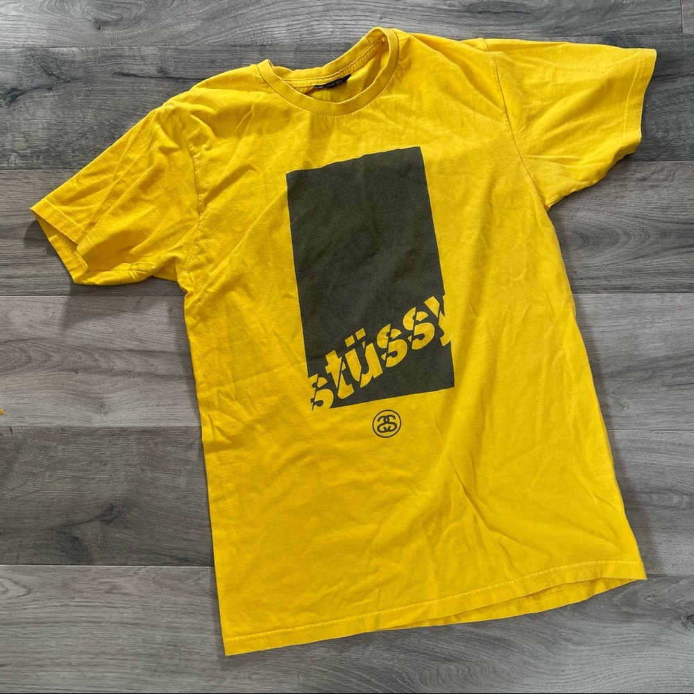 Stussy Yellow Short Sleeve Tee with Black Graphic